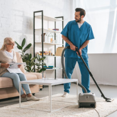aide cleaning the house
